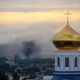 This July 14, 2014 file photo shows black smoke billowing following a mortar attack during fighting between Ukrainian government troops and pro-Russian fighters in Luhansk, Ukraine. The United States imposed unilateral sanctions on Russia over its threatening moves in Ukraine. AP Photo, Yuri Snegirev, Rossiyiskaya Gazeta)